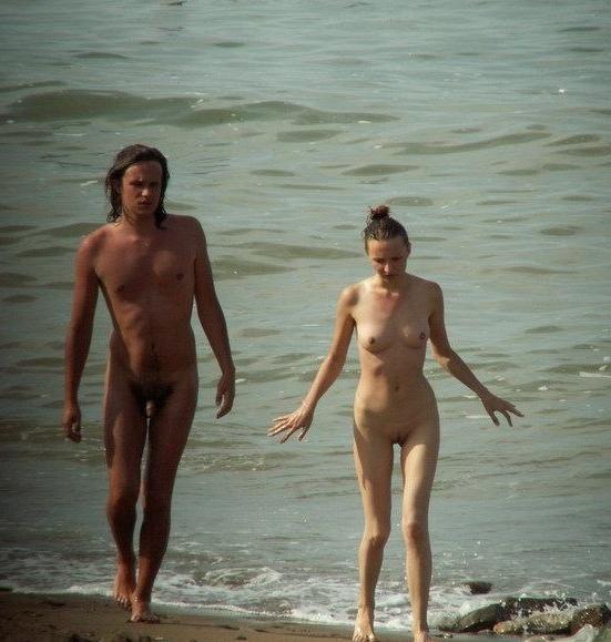 15P At the nudist beach teen girls play around naked