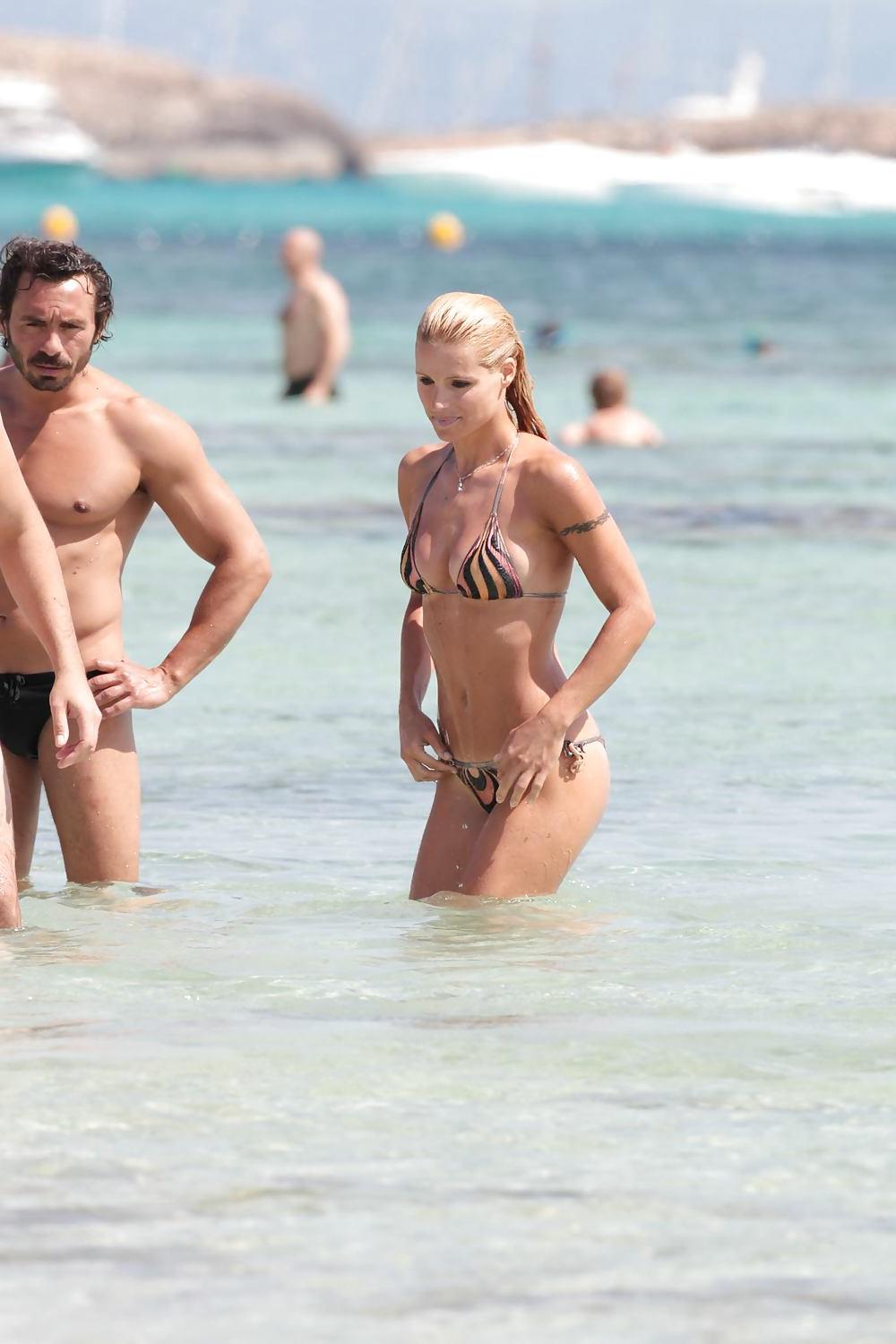 13P Michelle Hunziker Bikini candids Formentera Beach
