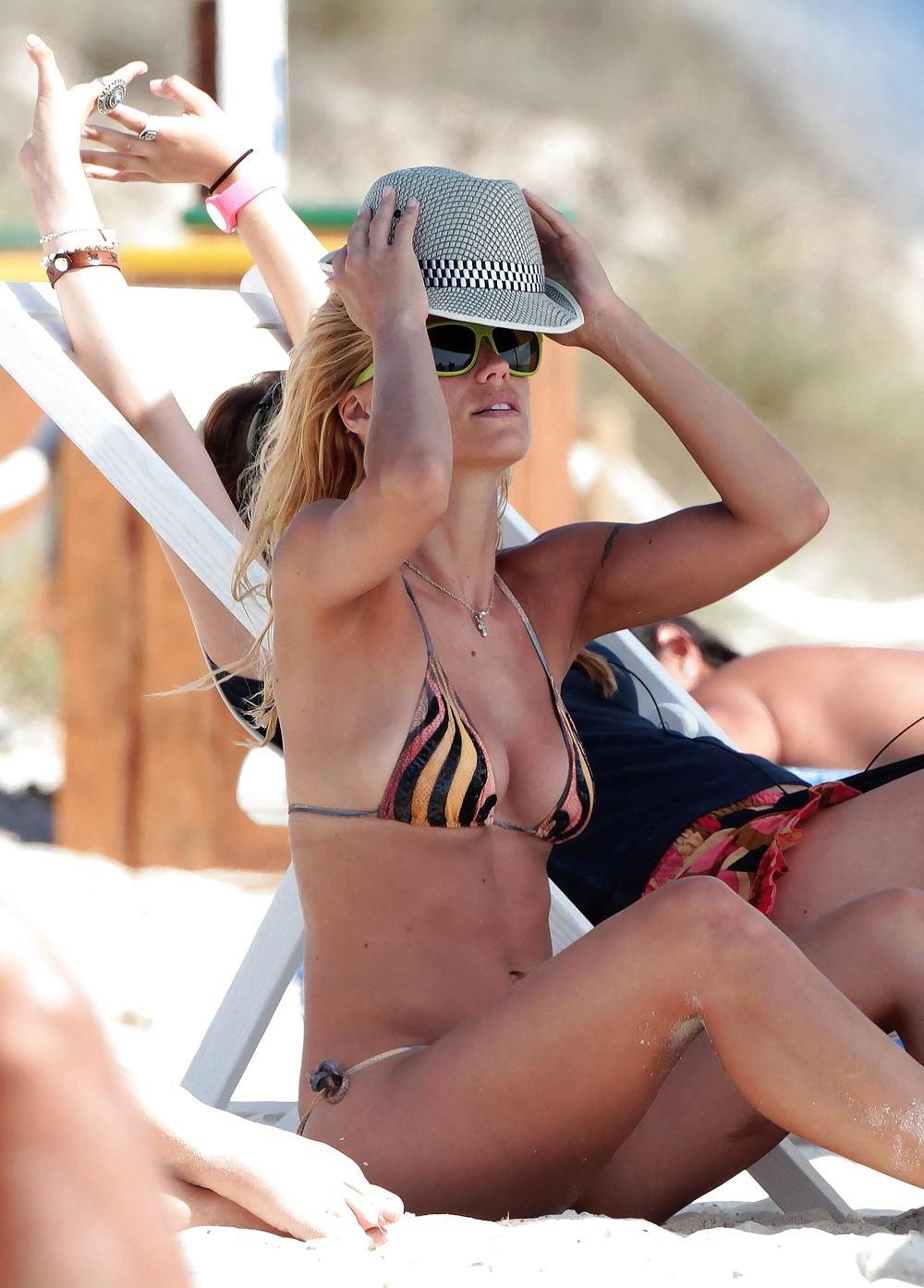 13P Michelle Hunziker Bikini candids Formentera Beach