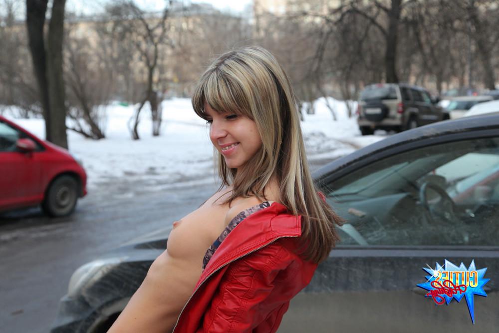 16P Winter flasher shows her perky tits in the street