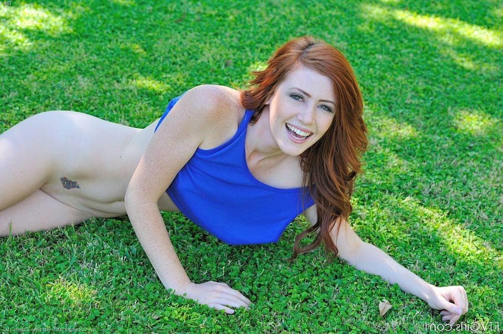 15P Cute redhead does pussy flashing cartwheels in park