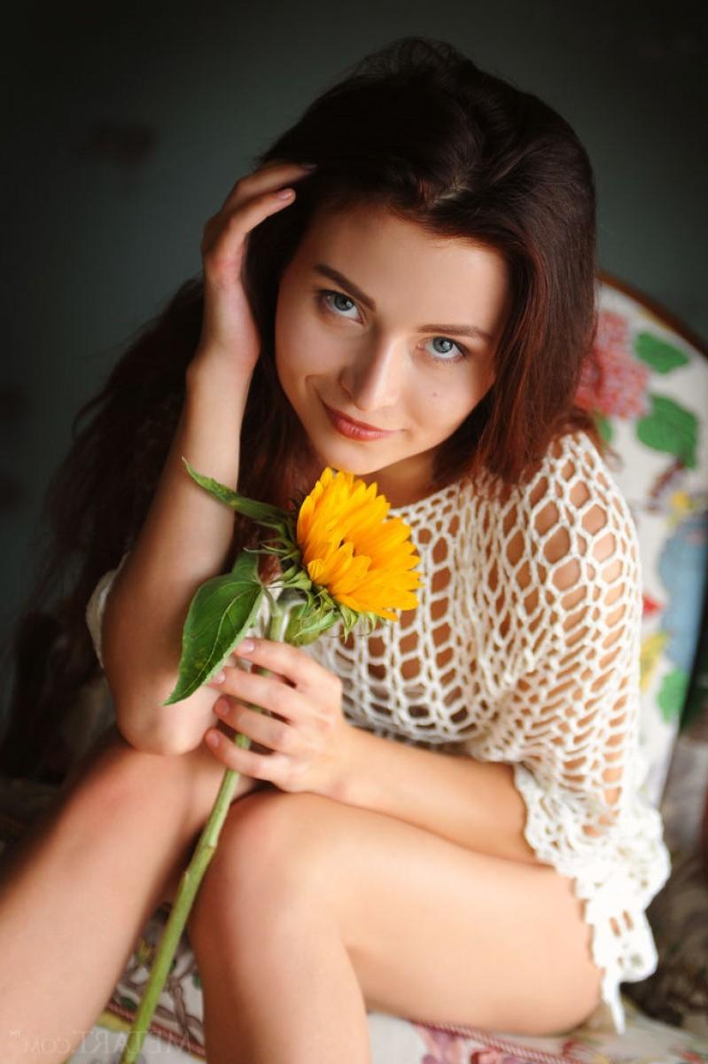 12P Sweet brunette posing in window light