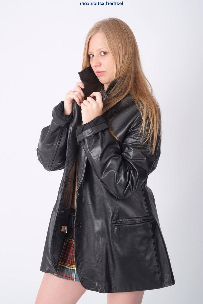 15P Hot blonde schoolgirl showing off in a leather jacket