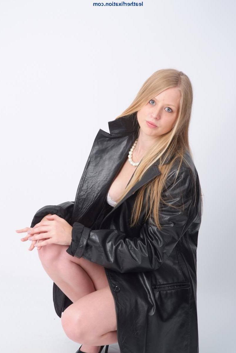 15P Hot blonde schoolgirl showing off in a leather jacket