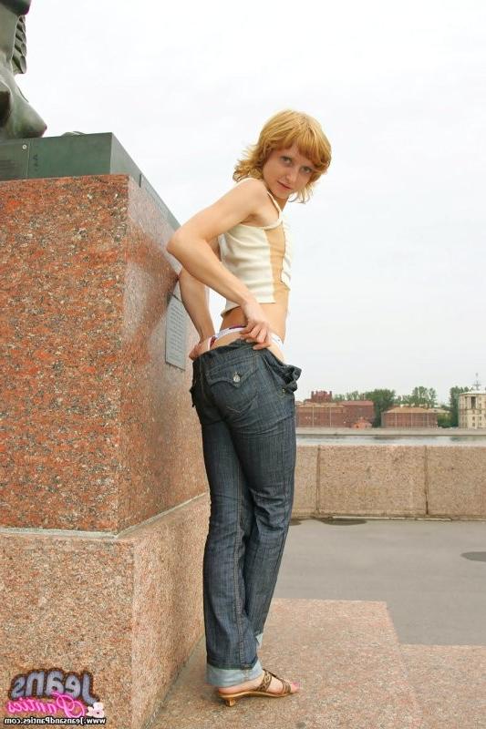 15P Horny young teen pulls down tight jeans to flash panties