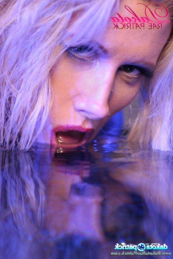 15P Blonde Pornstar babe, Dakota Rae Patrick, gets wild and wet in the pool flashing