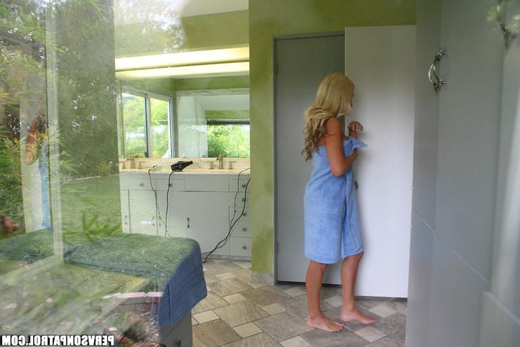 17P Big tits blonde babe caught by a voyeur by changing clothes