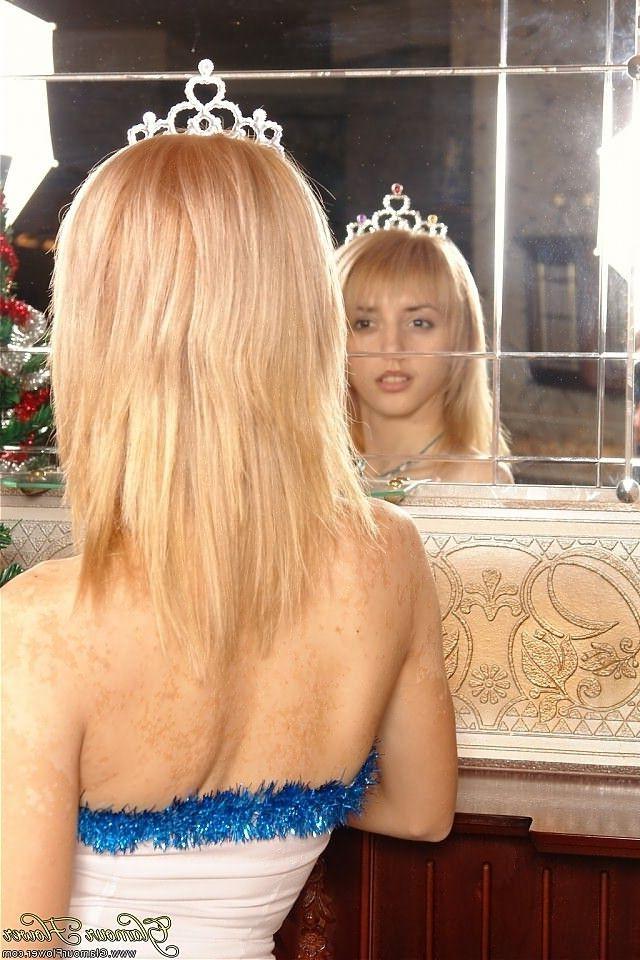 12P Young beauty queen posing in blue stockings