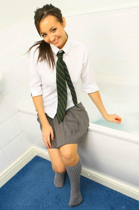 15P Sexy schoolgirl in uniform with knee socks
