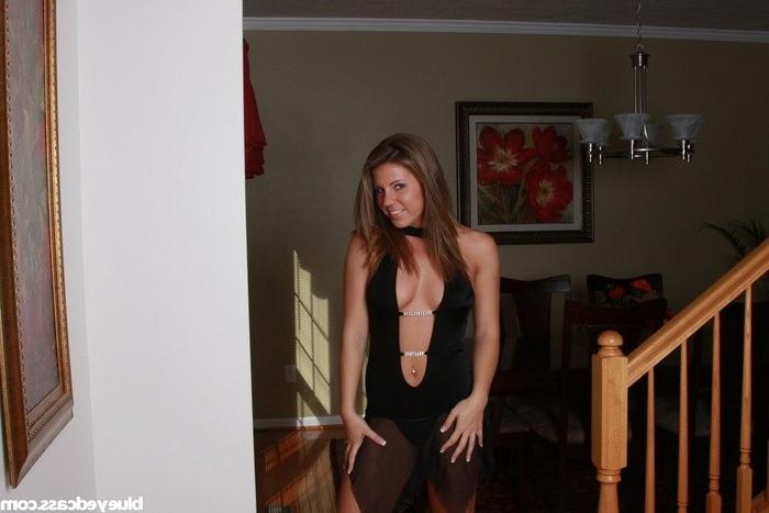 15P Horny young babe in a revealing black dress
