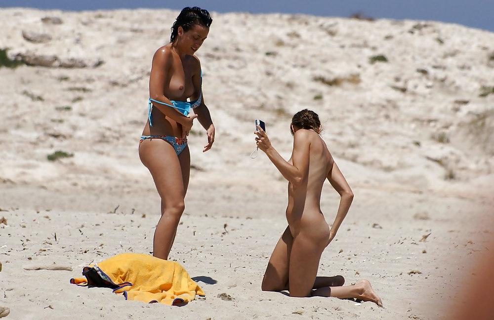 15P Beach nudists stripping off