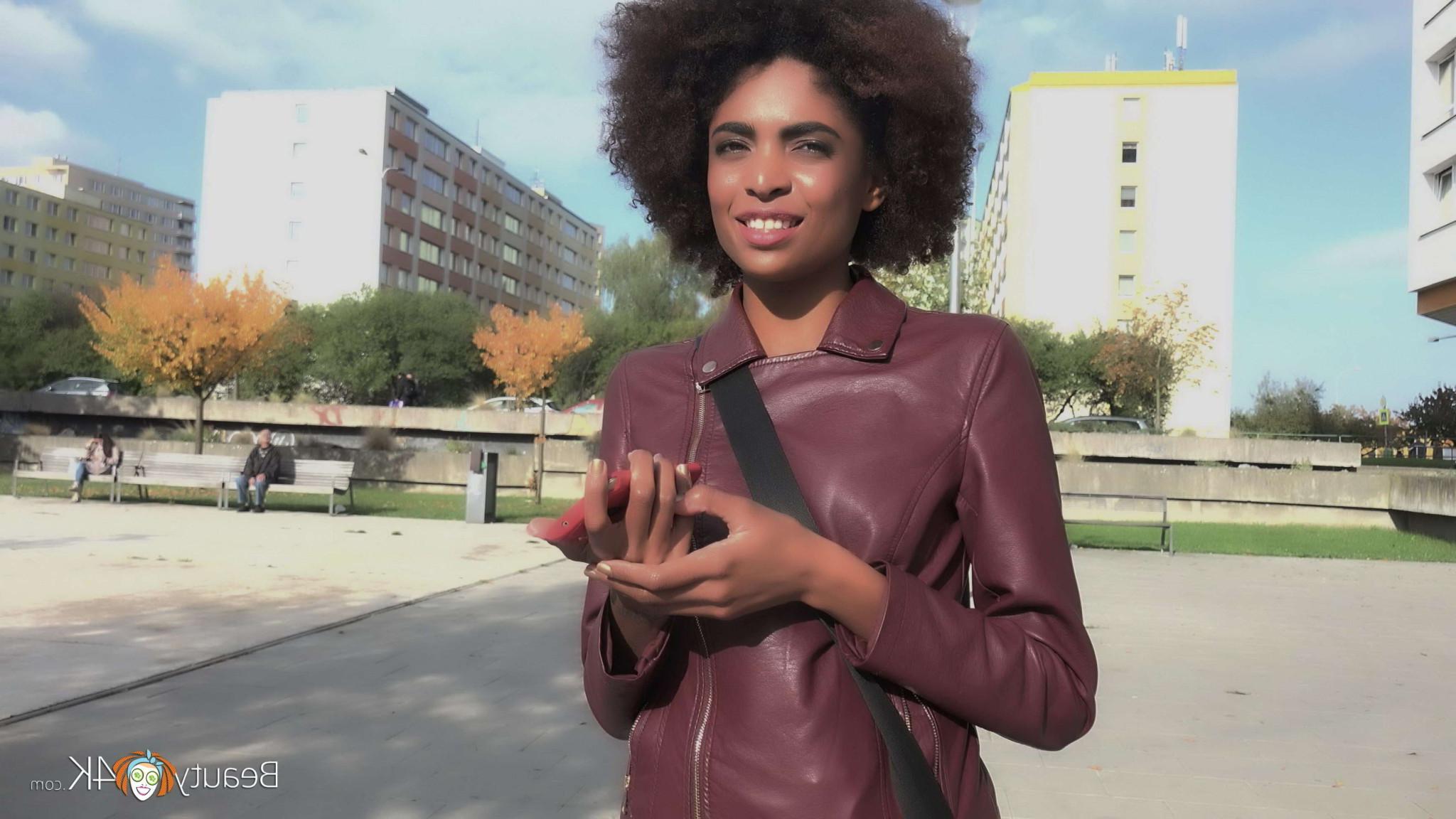 16P Ebony cutie seduces a white stud in a hard sex outdoors