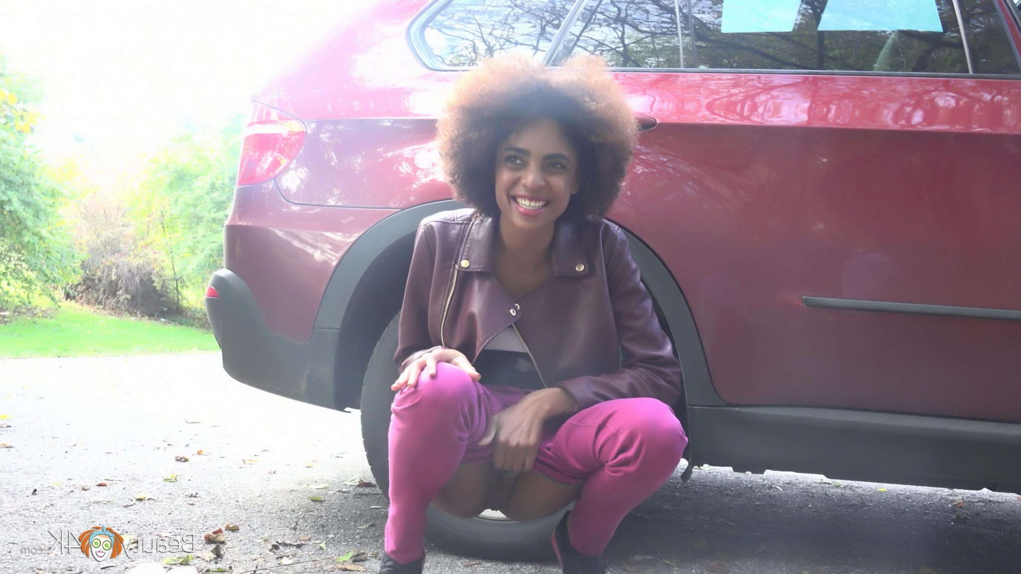 16P Ebony cutie seduces a white stud in a hard sex outdoors
