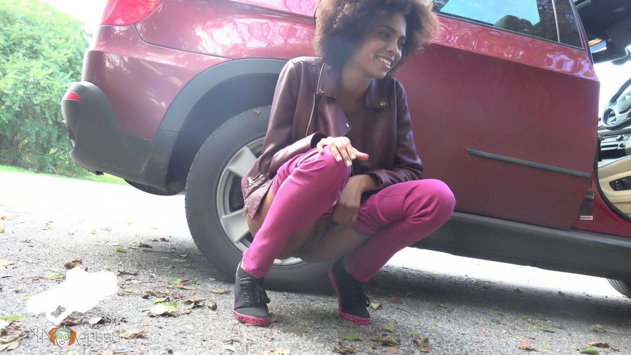 16P Ebony cutie seduces a white stud in a hard sex outdoors