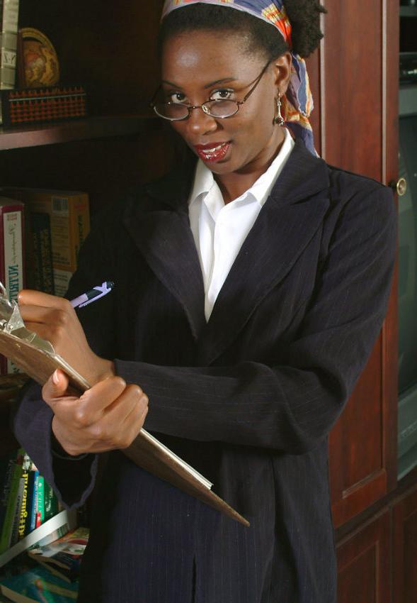 15P Ebony secretary in stockings posing