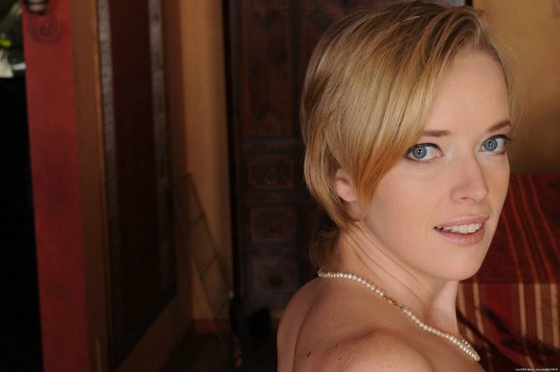 15P Lovely blonde Marley Stone exposes her hairy pussy