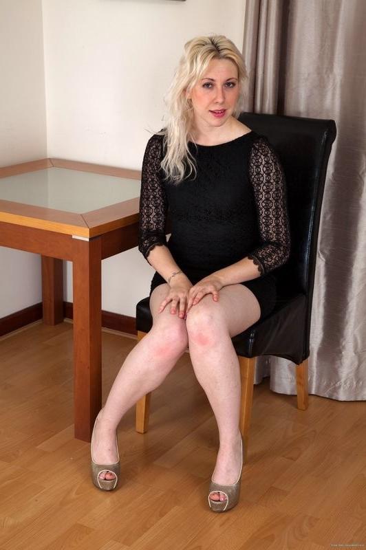15P Sweet blonde Emma spreads her hairy pussy