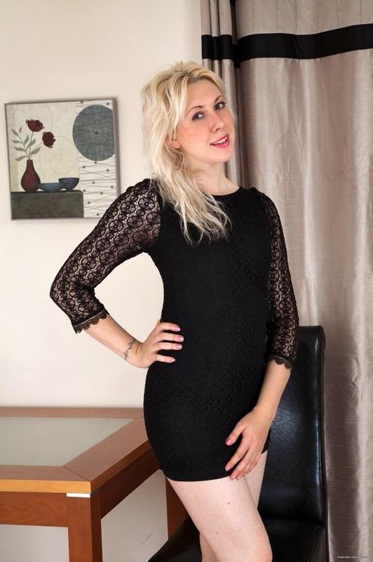 15P Sweet blonde Emma spreads her hairy pussy