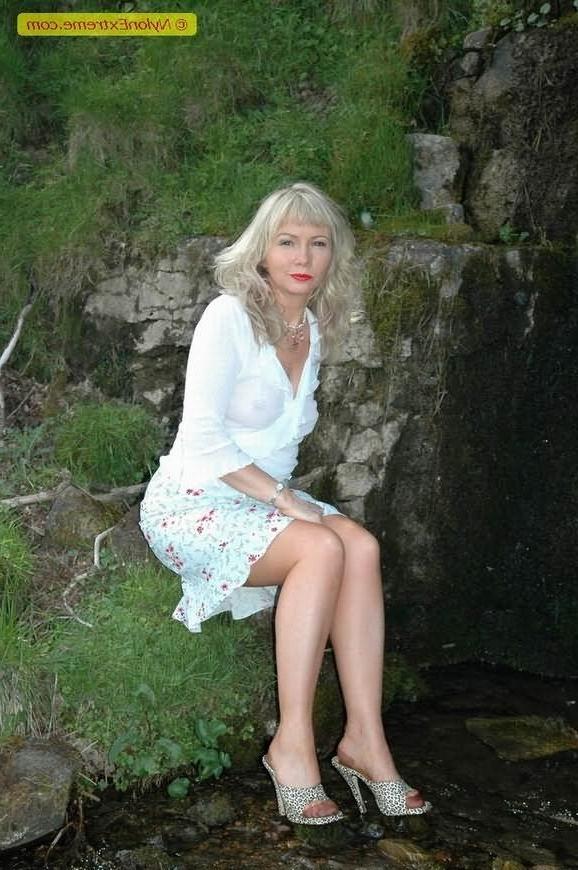12P Nylon fetish milf Sue posing in the woods