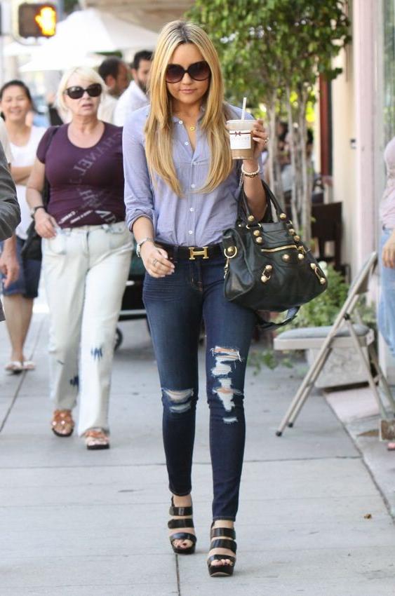 15P Petite young actress Amanda Bynes gives a peek up her skirt