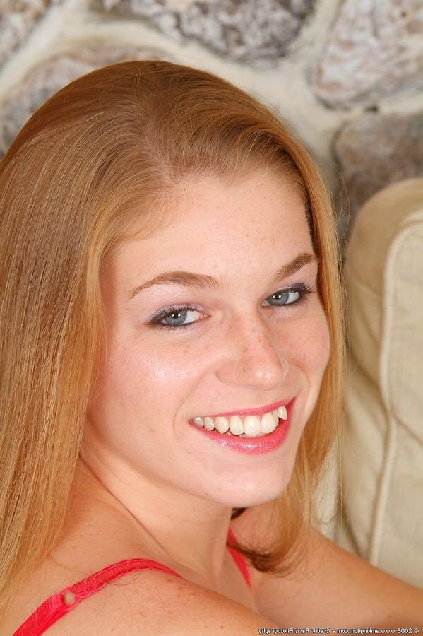12P Tiny teen rubs her shaved cunt on the leather couch