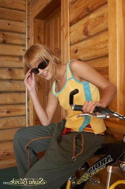 17P Young exciting blonde lady pulling down all her fancy garments