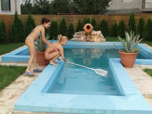 15P Horny young lesbians having sex by the pool