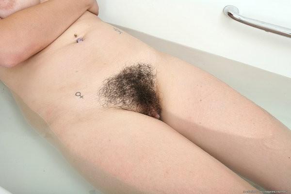 15P Khyla exposes her thick hairy pussy pie