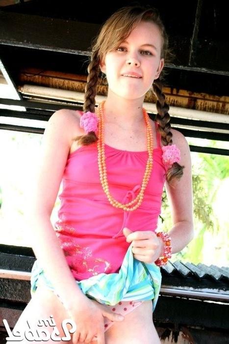 16P Small teen girl flashing in skirt