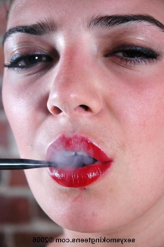 16P Kinky teen in PVC with a cigarette holder