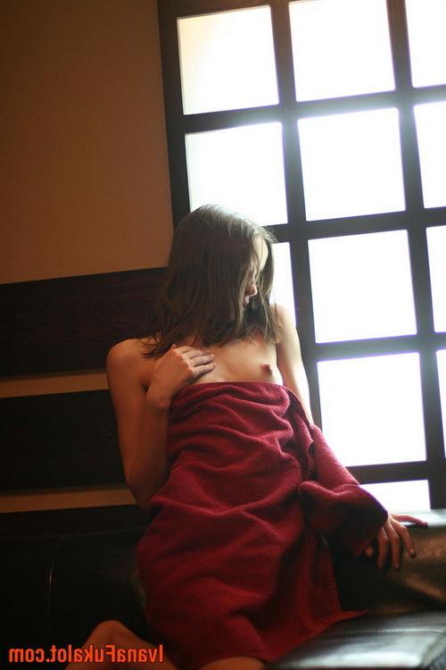 17P Seductive young model with nice small tits exposes herself