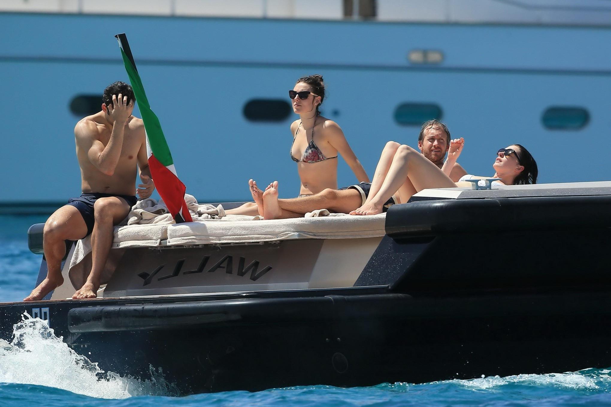 16P Anne Hathaway busty in a tiny twopiece at the yacht