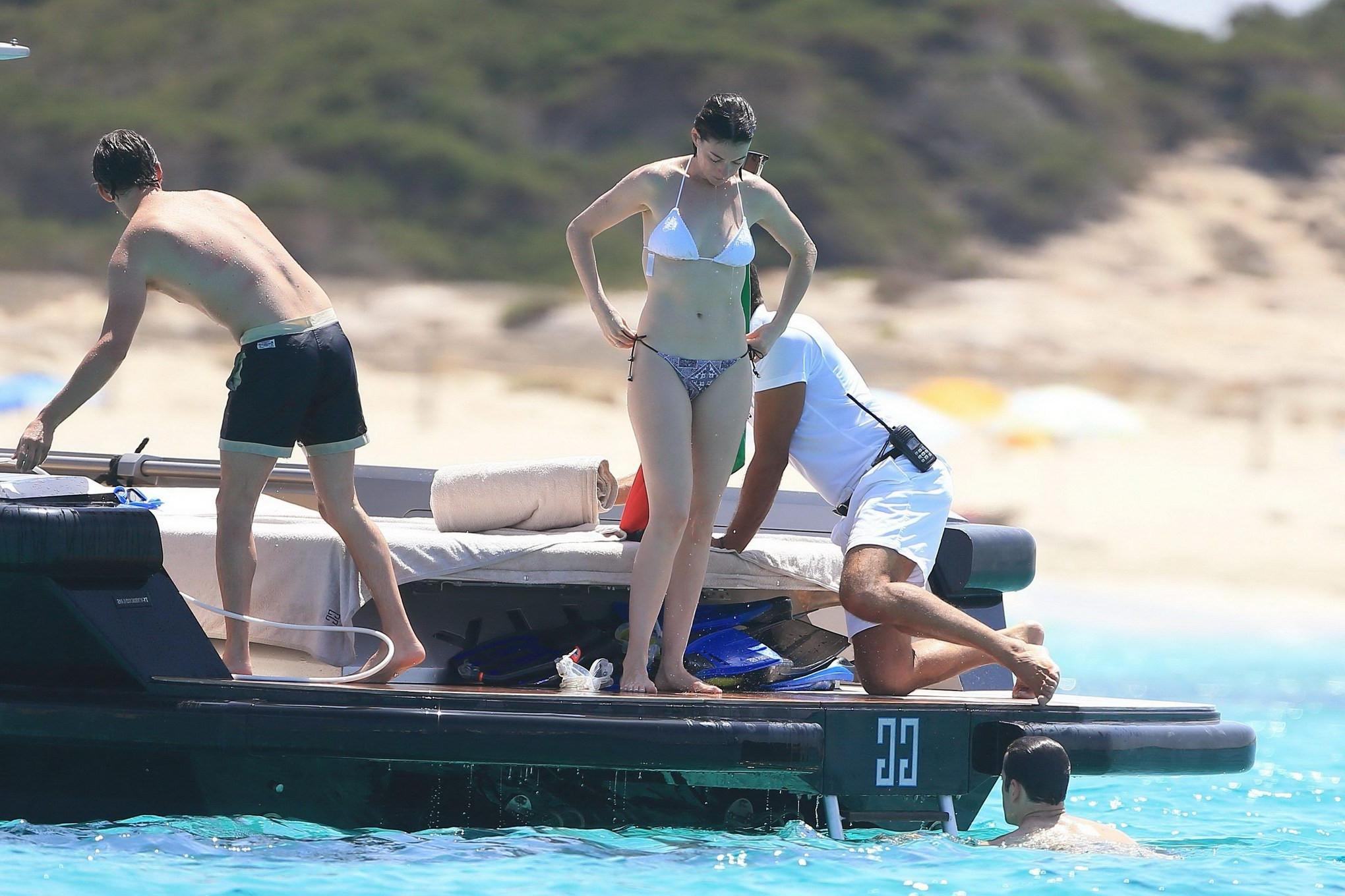 16P Anne Hathaway busty in a tiny twopiece at the yacht