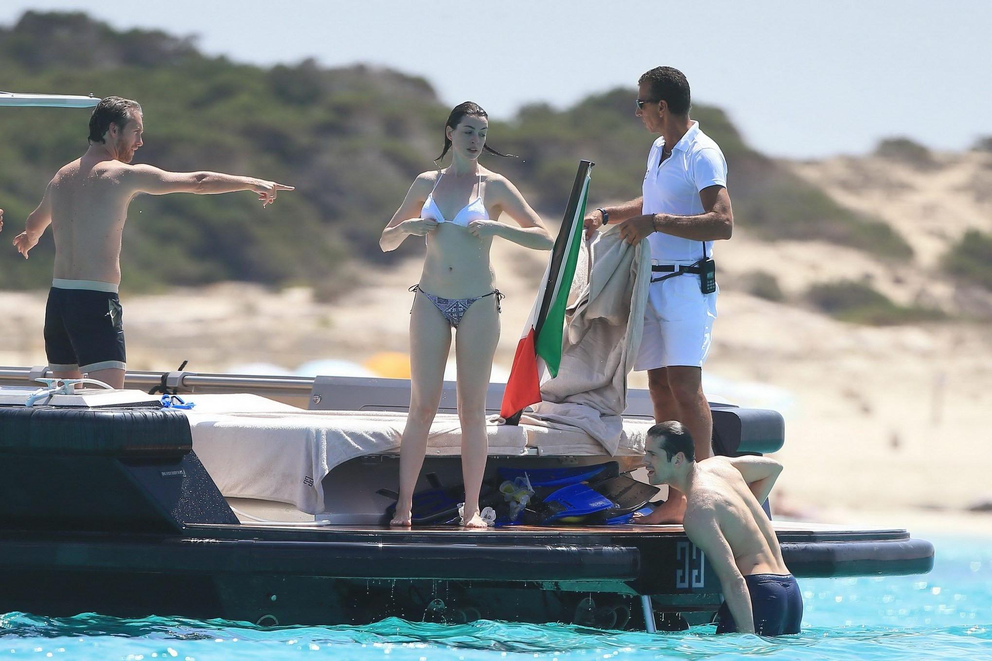16P Anne Hathaway busty in a tiny twopiece at the yacht