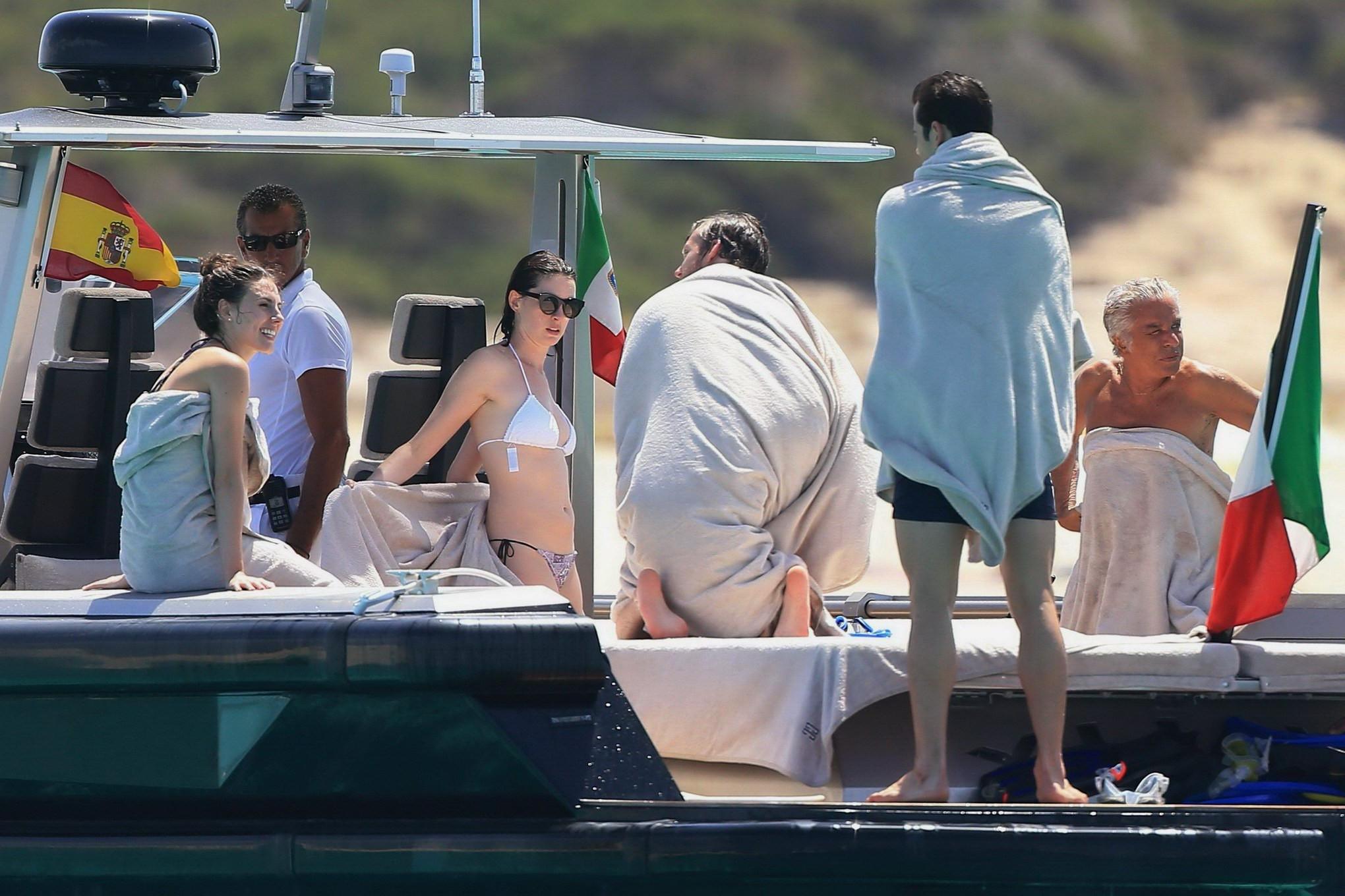 16P Anne Hathaway busty in a tiny twopiece at the yacht