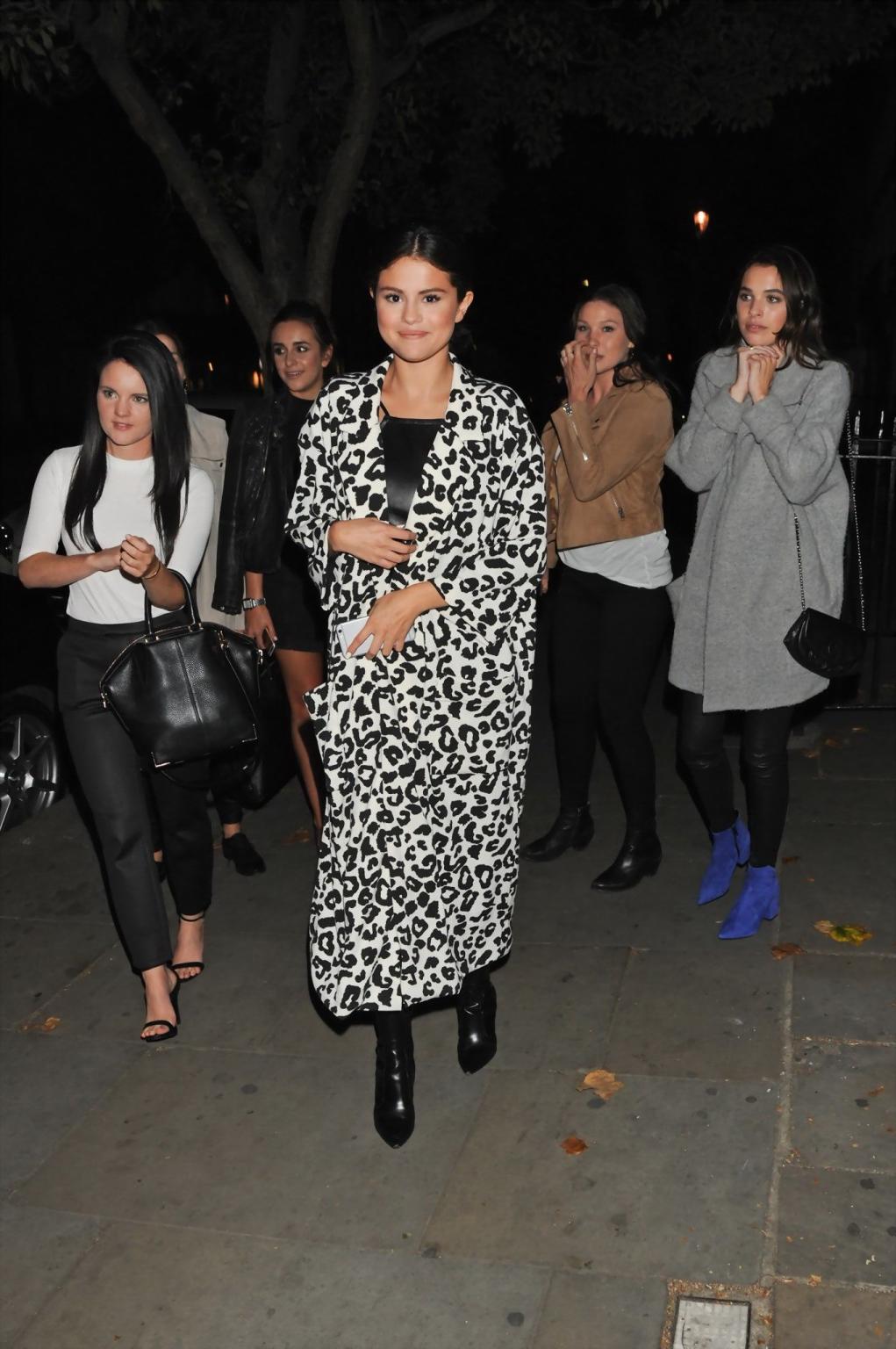 16P Selena Gomez busty wearing tight black leather in London