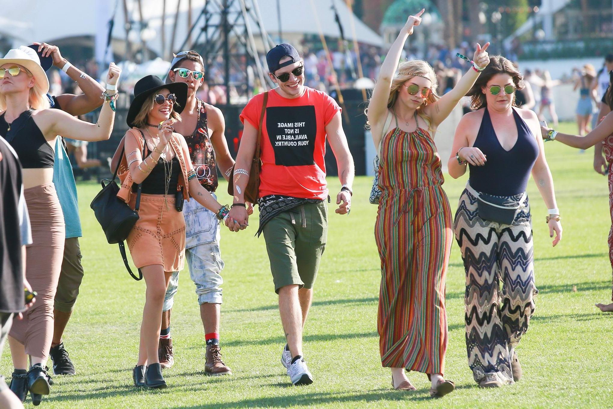 16P Sarah Hyland cleavy and leggy in black top and leather mini skirt at Coachella V