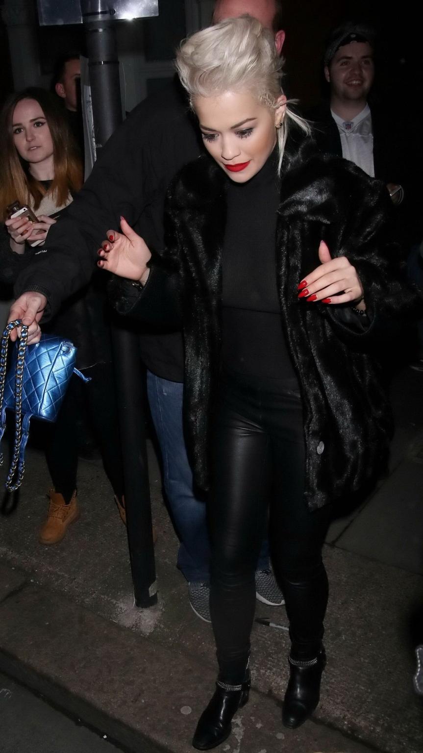16P Rita Ora showing boobs in seethru top and leather pants at the Shepherds Bush Em