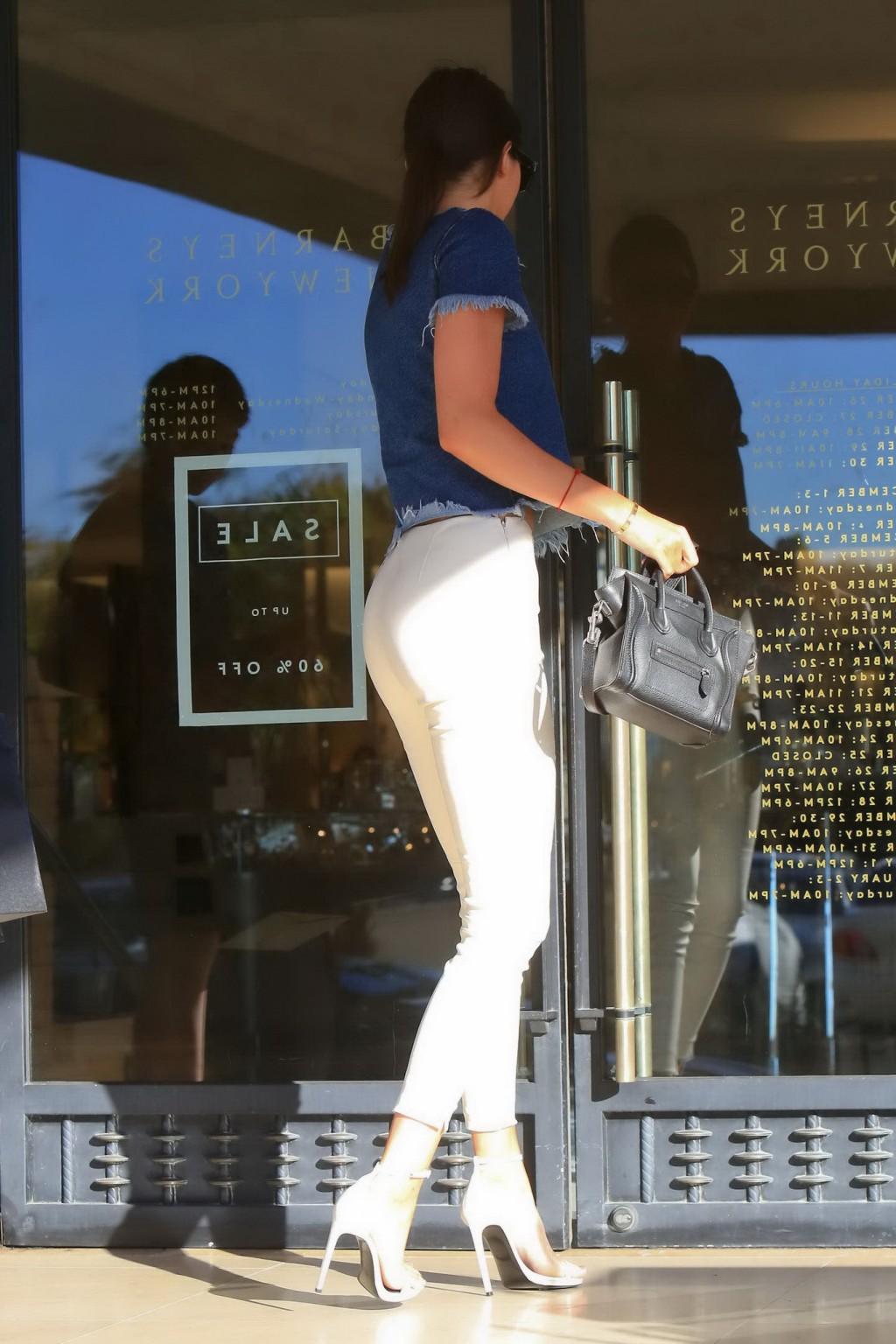 16P Kendall Jenner showing ass in tight white pants and denim top while shopping in 