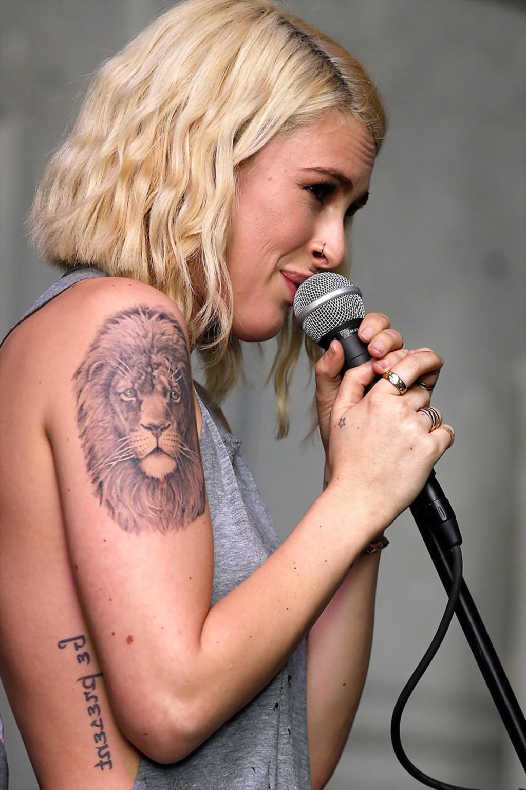 16P Rumer Willis shows sideboob braless in a ripped top and leather pants at the eve