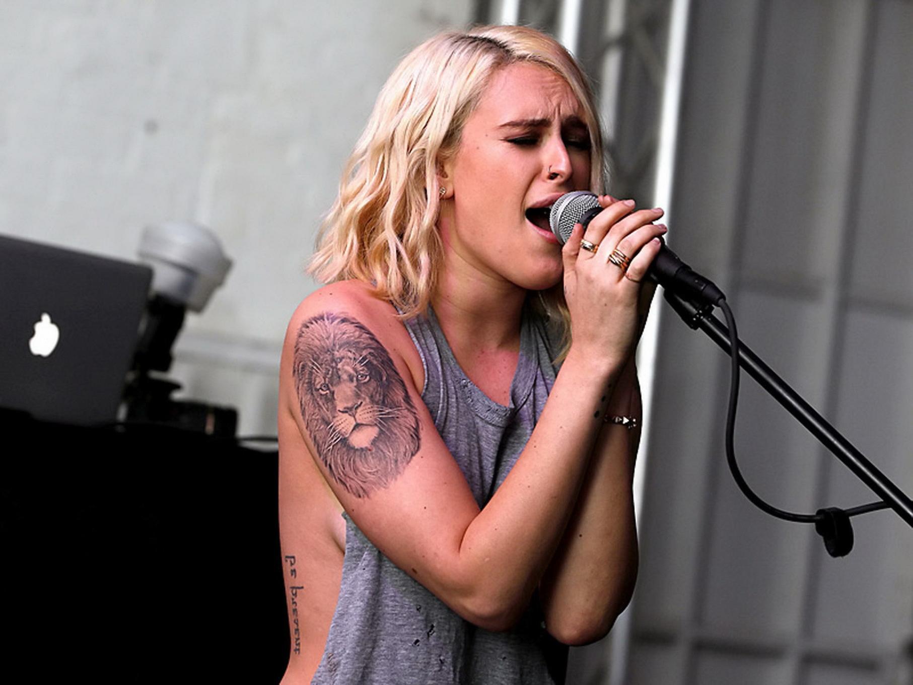 16P Rumer Willis shows sideboob braless in a ripped top and leather pants at the eve