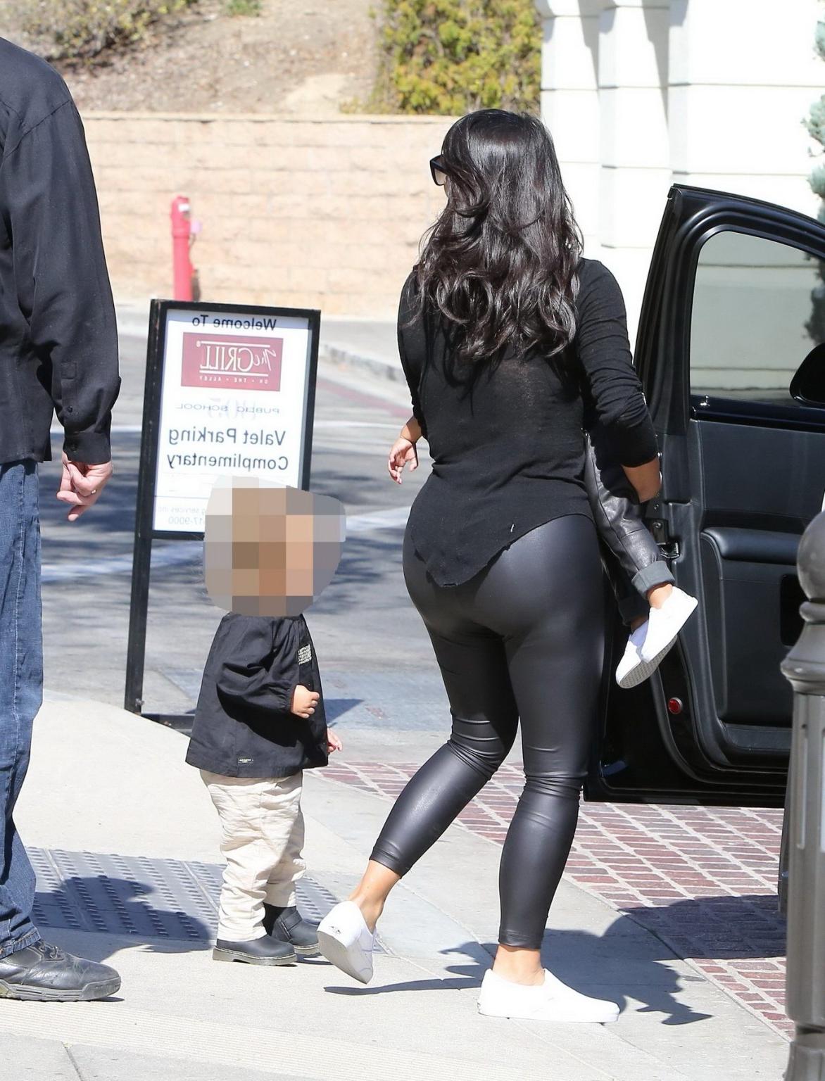 16P Kim Kardashian shows off her booty in black leather pants leaving The Grill in C