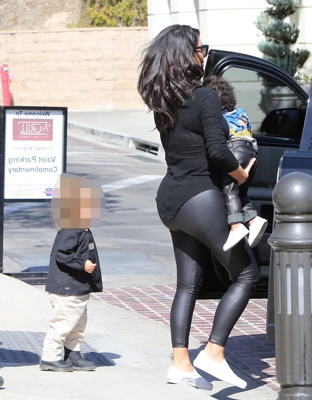 16P Kim Kardashian shows off her booty in black leather pants leaving The Grill in C