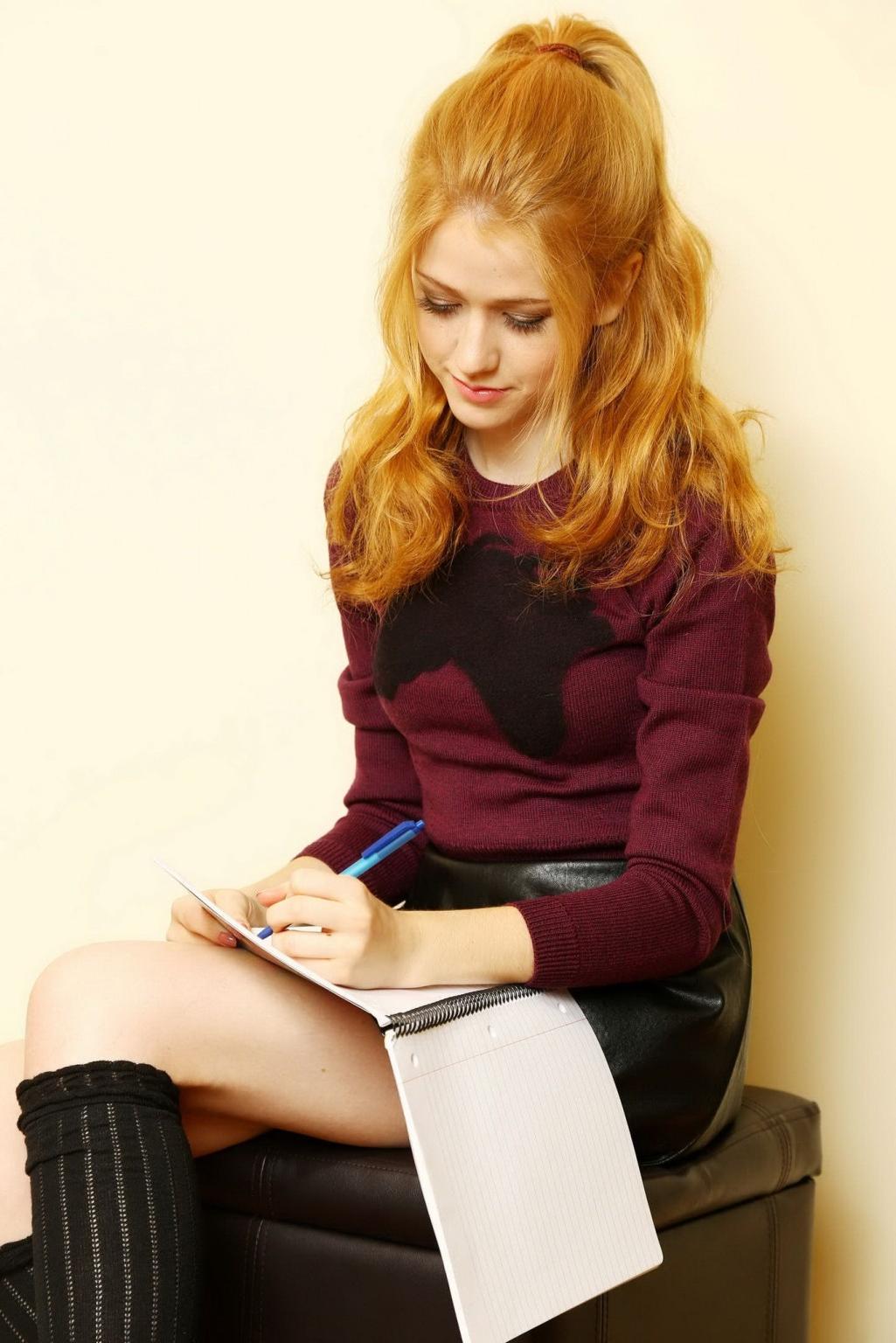 11P Katherine McNamara leggy wearing black leather mini skirt and blouse at Sara Jay