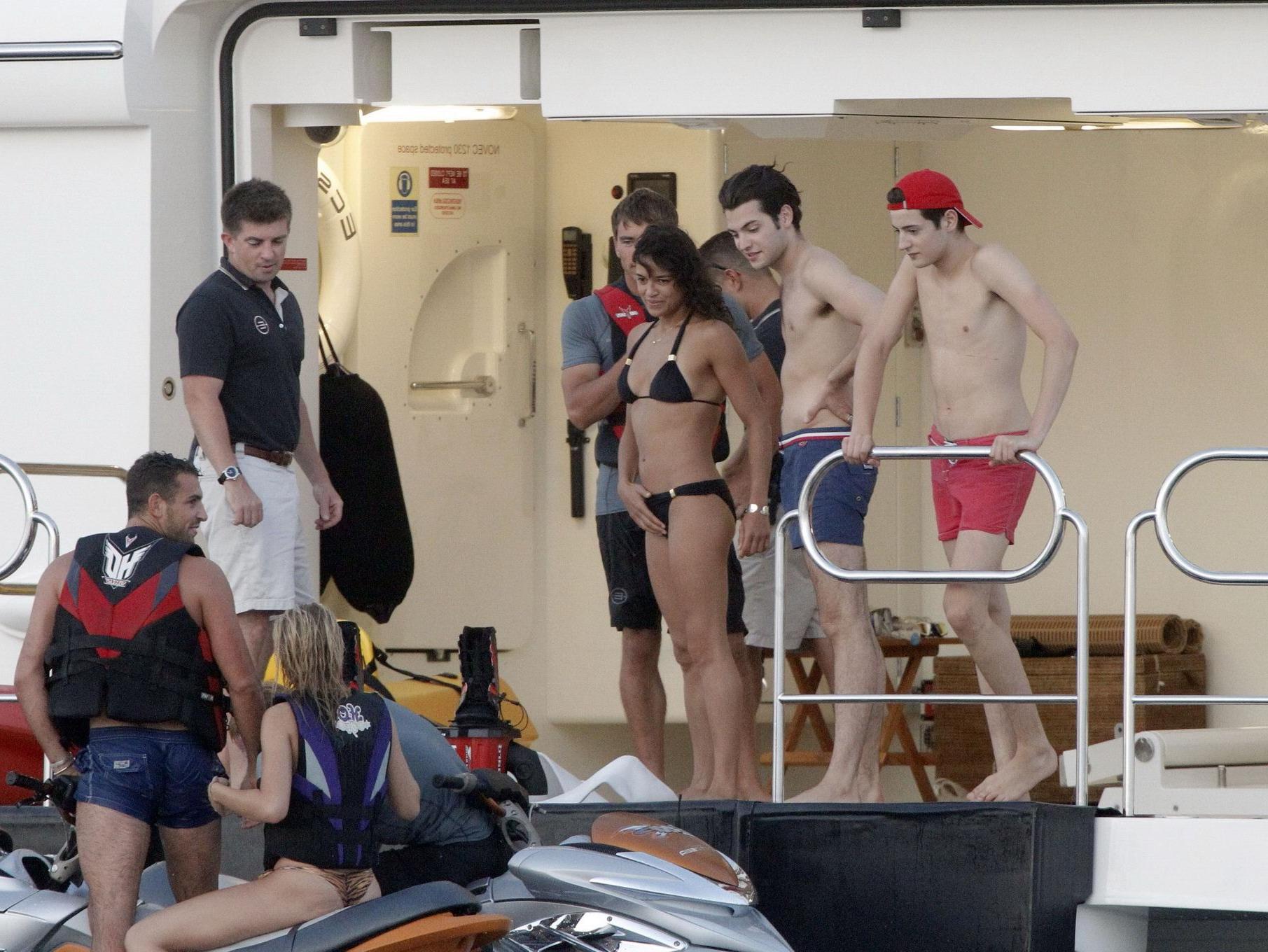 16P Michelle Rodriguez wearing a sexy black bikini on a yacht in Formentera