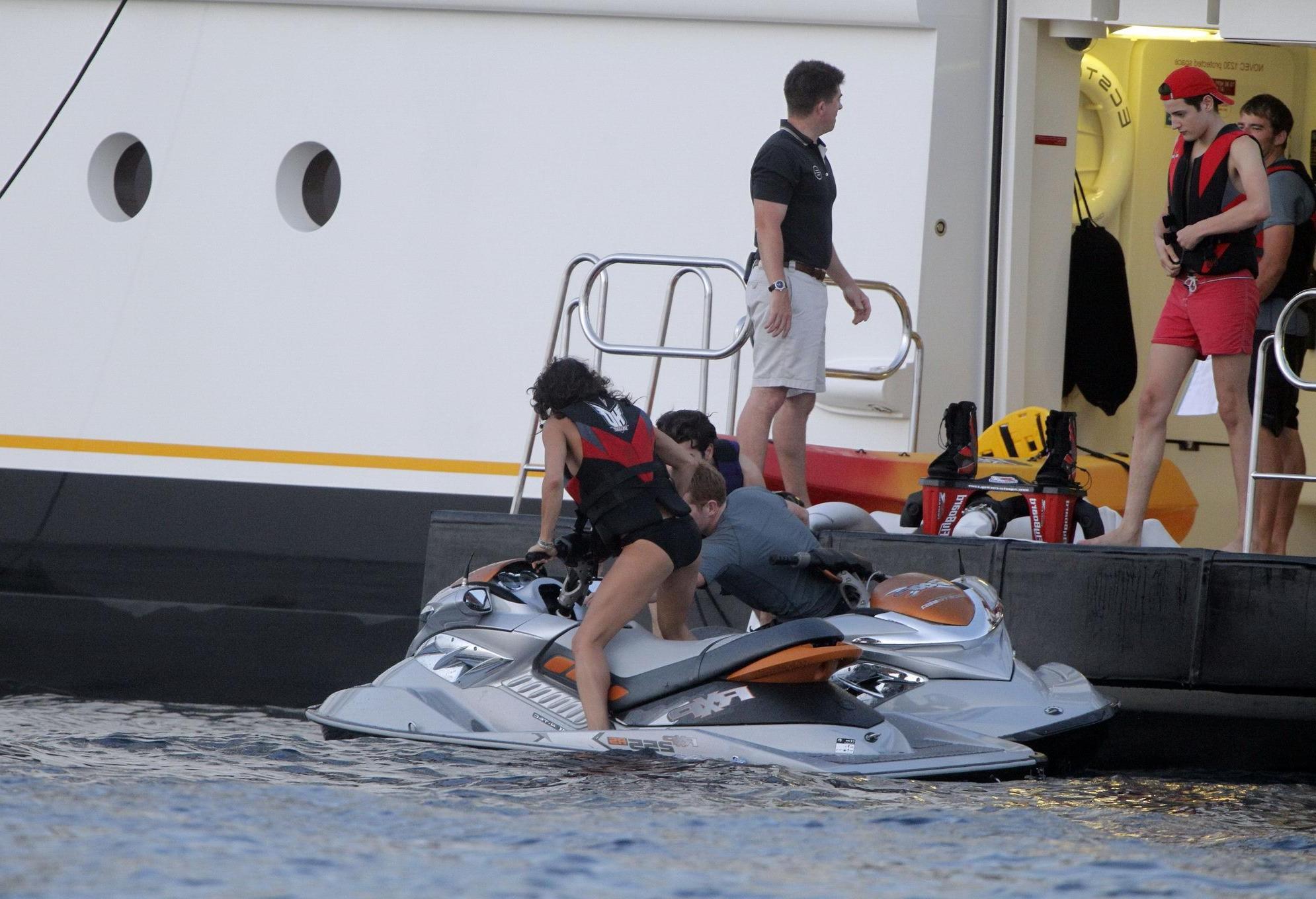 16P Michelle Rodriguez wearing a sexy black bikini on a yacht in Formentera
