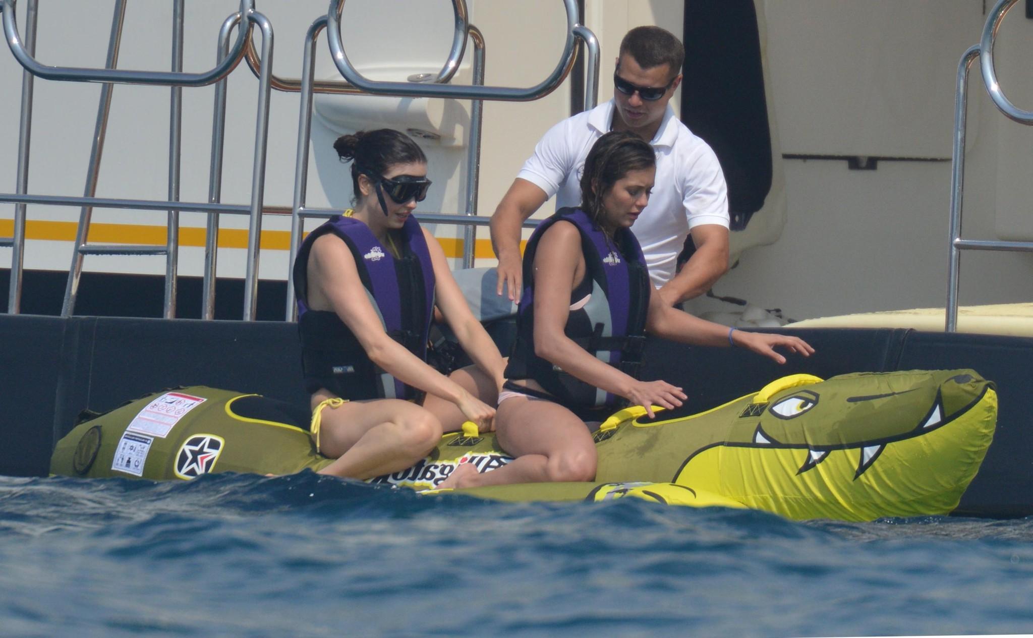 16P Nina Dobrev wearing a flesh colored bikini on a yacht in St Tropez
