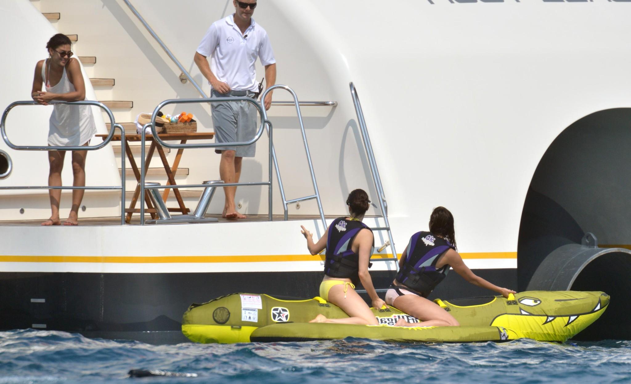 16P Nina Dobrev wearing a flesh colored bikini on a yacht in St Tropez