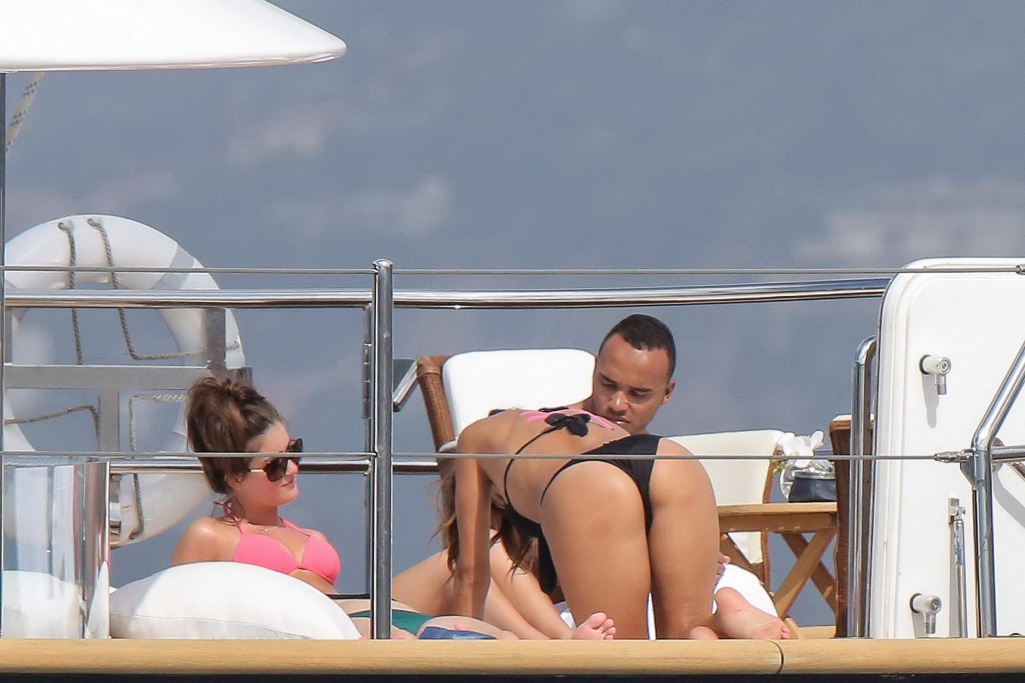 16P Nicole Scherzinger showing off her bikini body on a yacht in Monte Carlo