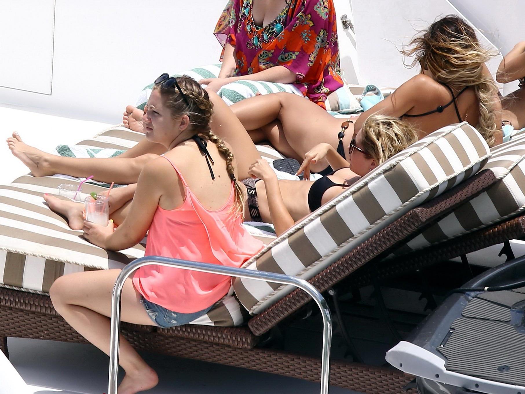 16P Vanessa Hudgens wearing sexy black bikini on a yacht in Miami